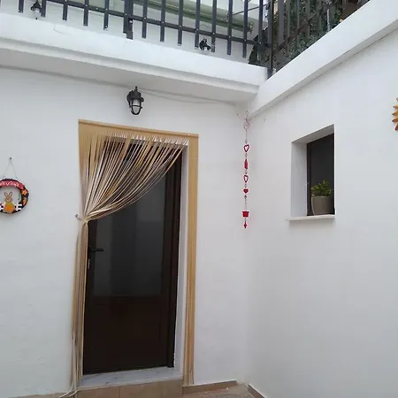 Theanos House *
